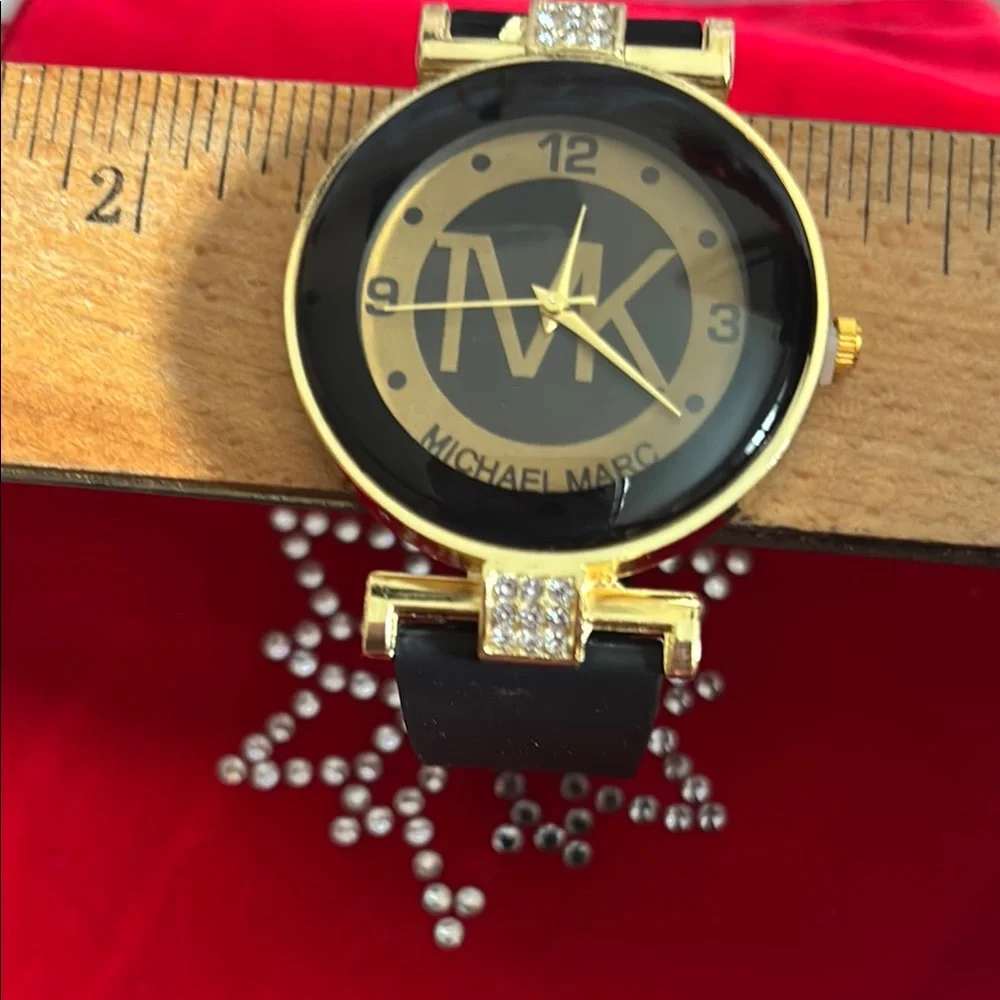 Michael Marc Black and Gold Watch